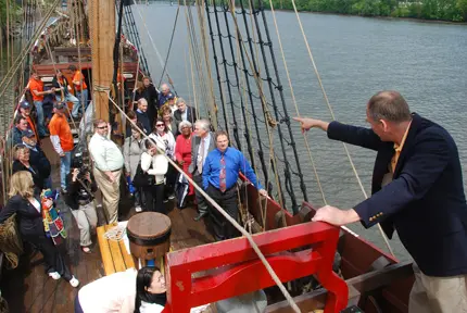People on a historic ship deck